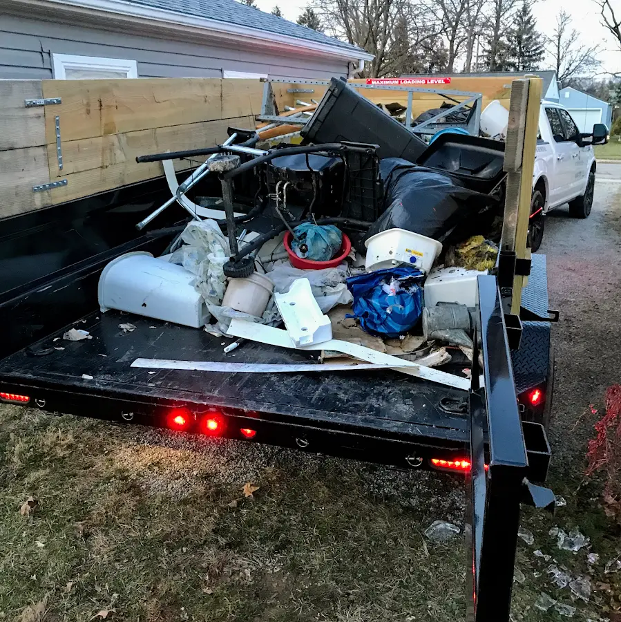 Roll-off dumpster delivered to a residential driveway in Maitland