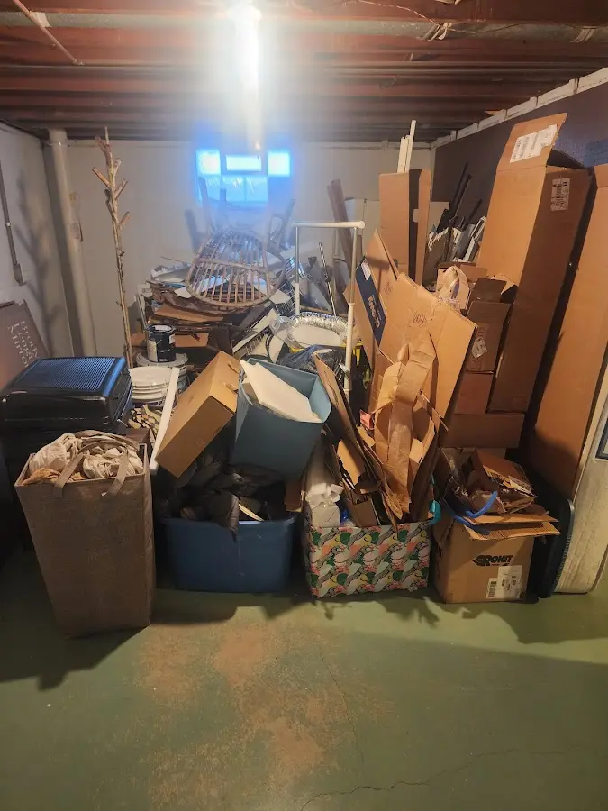 Roll-off dumpster container at job site for 15 Yard Dumpster Rental in Maitland